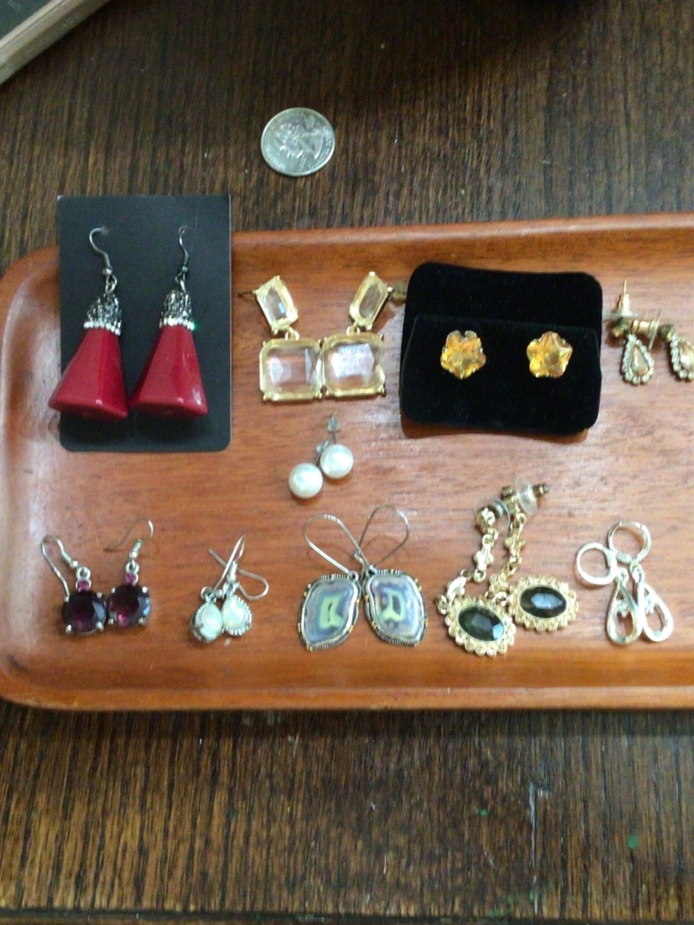 Lot Of 10 pair of fashion earrings. One of which is sterling silver. Great shape